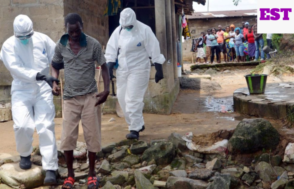 Medical Practitioner handling an Ebola Patient with PPE 